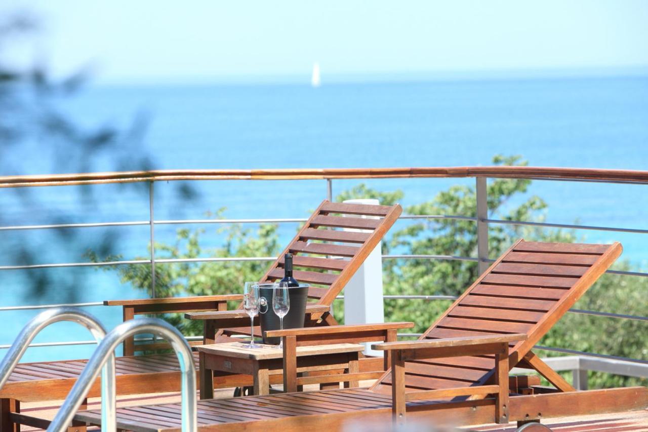 Capro - Milos Bay Villas Áyios Nikítas Exterior foto